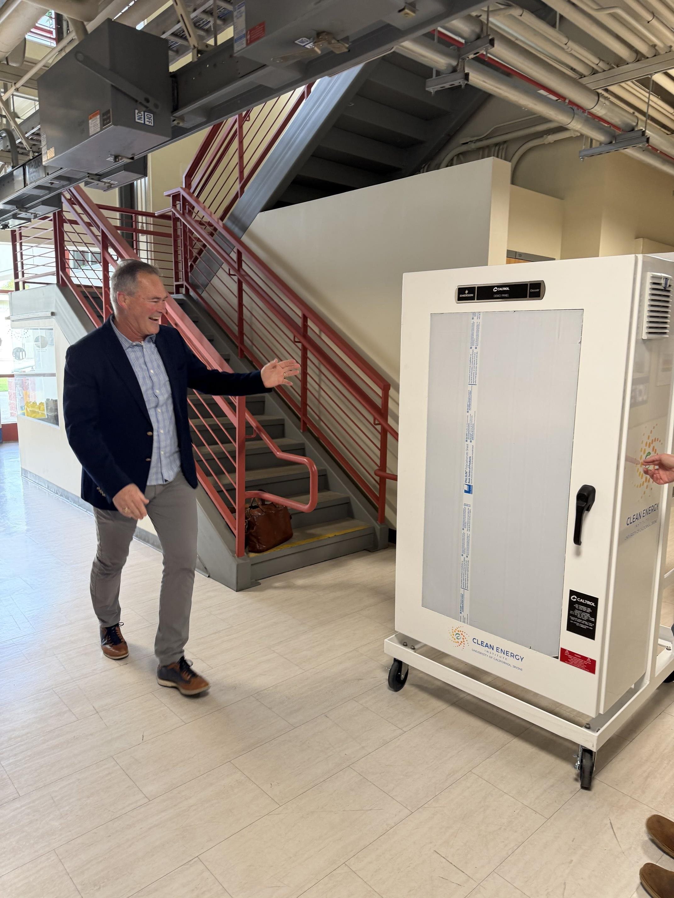 Professor Brouwer receiving the skid. 